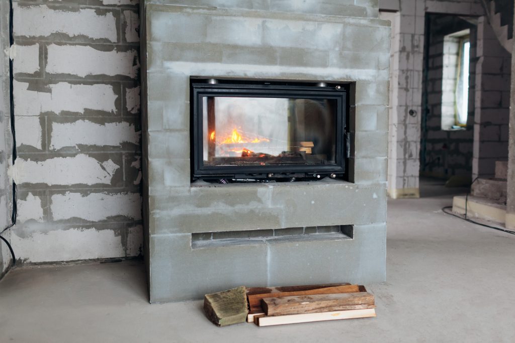 AdobeStock Image of a fireplace mid-installation.