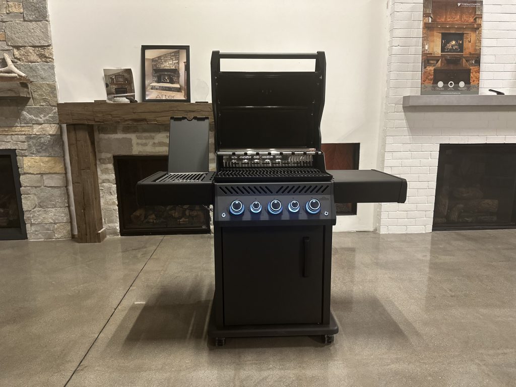Original photo from The Fire Factory of a black grill with handles