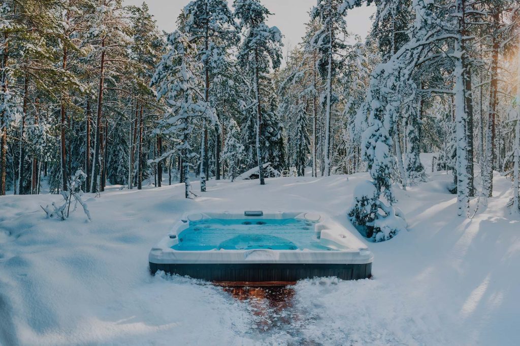 Original photo from The Fire Factory of an outdoor spa or hot tub surrounded by snow.